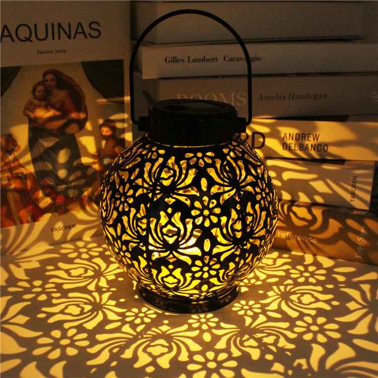 Solar iron hollow projection lamp